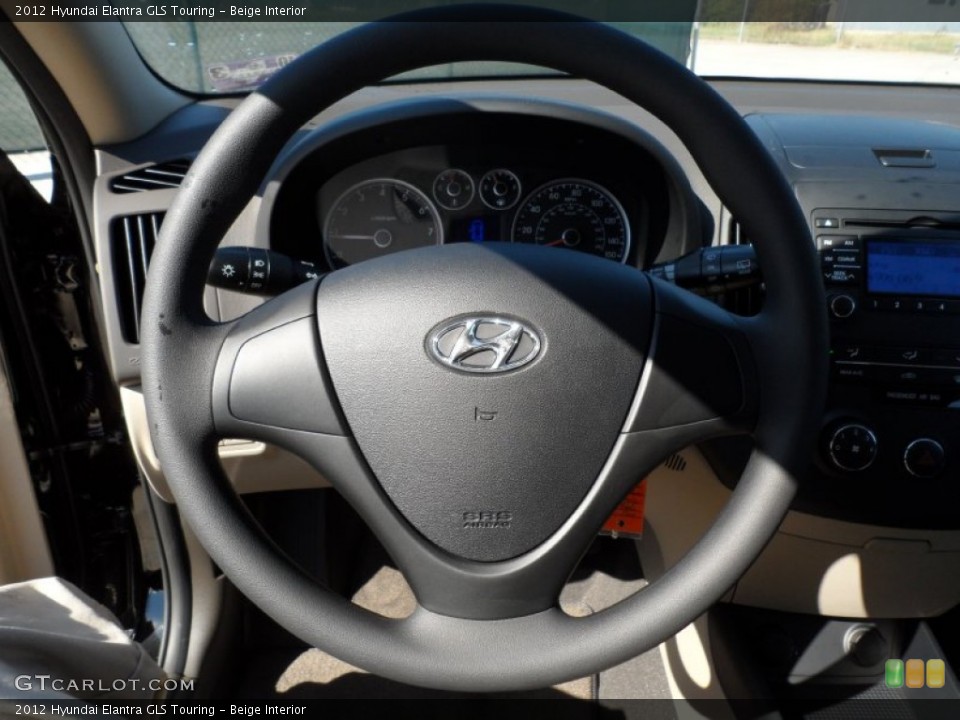 Beige Interior Steering Wheel for the 2012 Hyundai Elantra GLS Touring #54953461