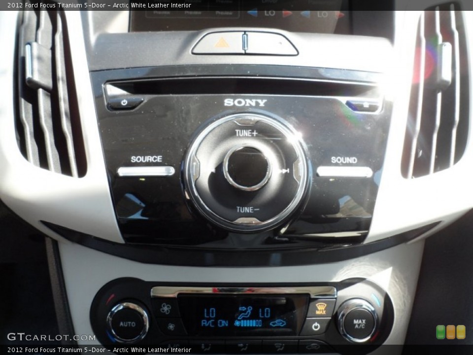 Arctic White Leather Interior Controls for the 2012 Ford Focus Titanium 5-Door #54954805