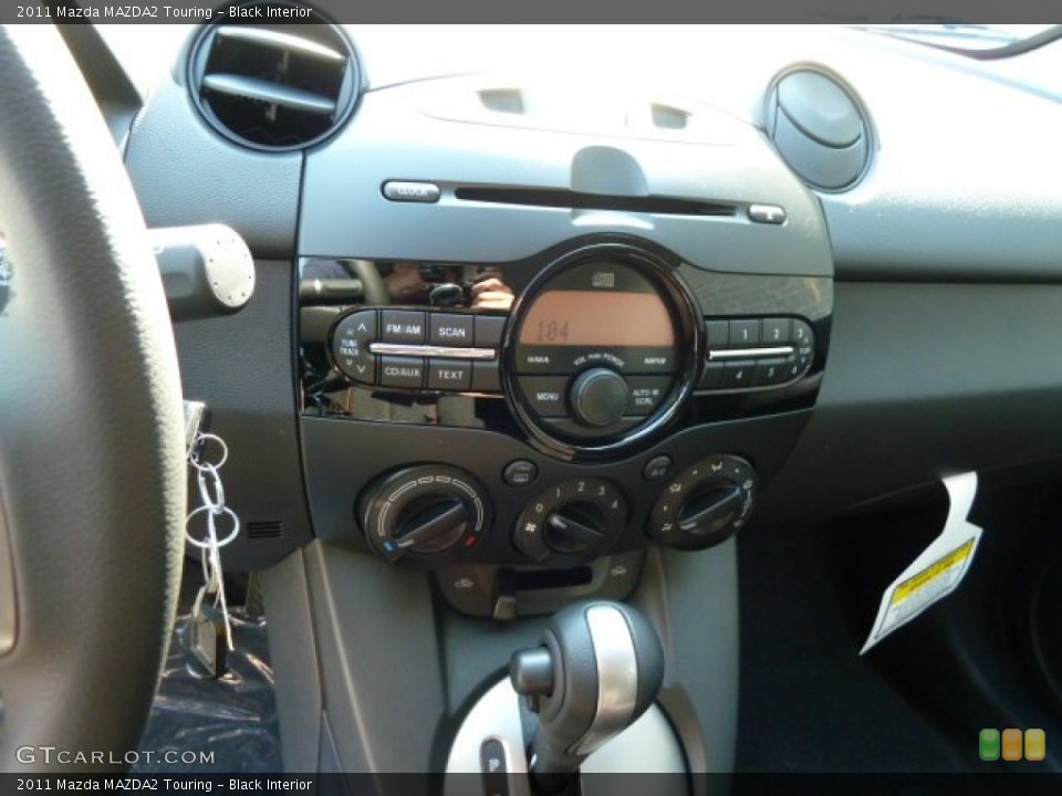 Black Interior Controls for the 2011 Mazda MAZDA2 Touring #54975175