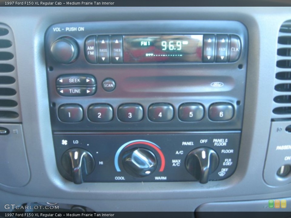 Medium Prairie Tan Interior Audio System for the 1997 Ford F150 XL Regular Cab #54977845