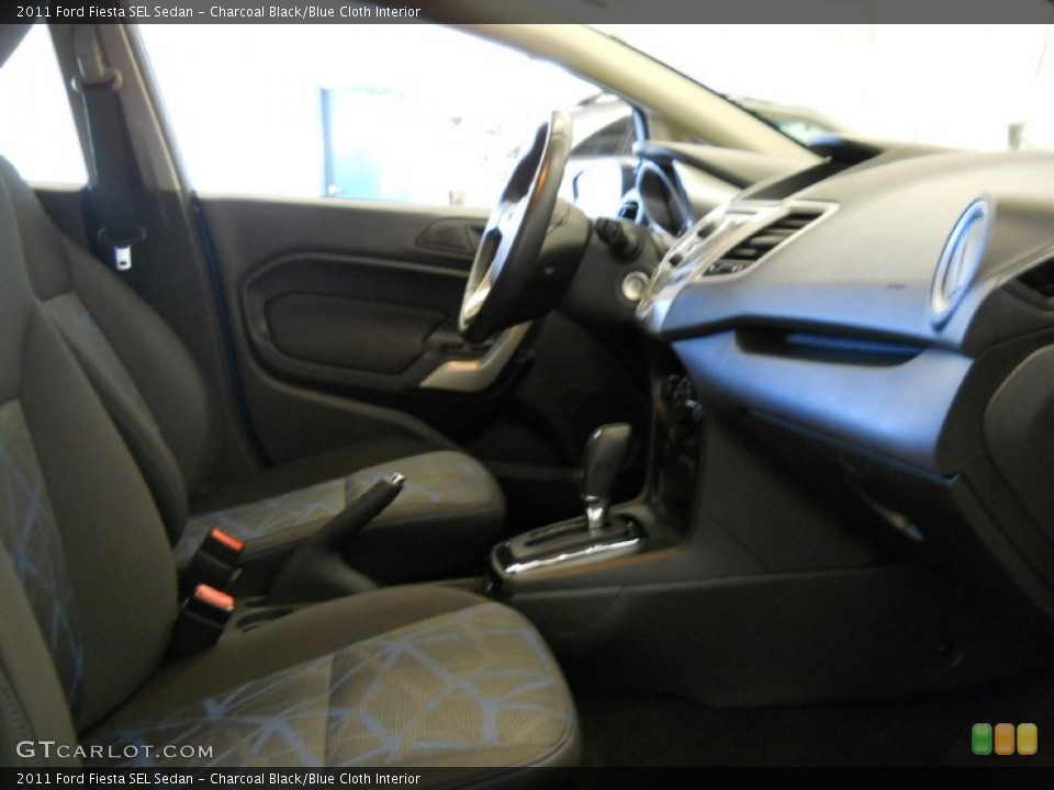 Charcoal Black/Blue Cloth Interior Photo for the 2011 Ford Fiesta SEL Sedan #55043787