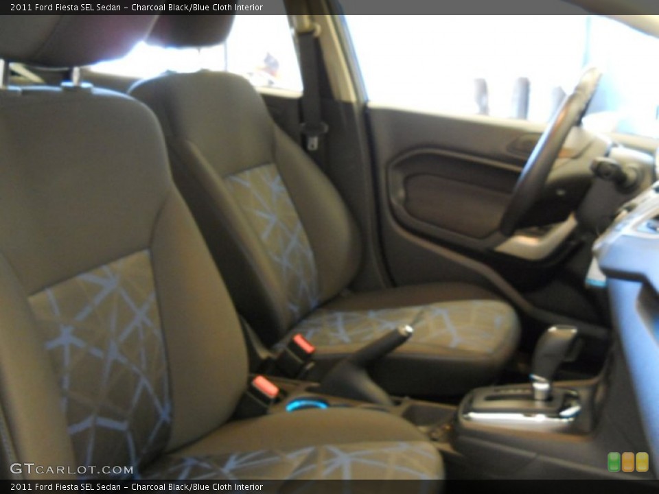 Charcoal Black/Blue Cloth Interior Photo for the 2011 Ford Fiesta SEL Sedan #55043793