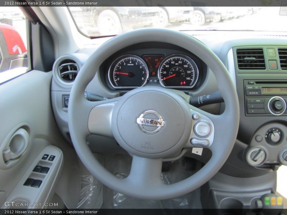 Sandstone Interior Steering Wheel for the 2012 Nissan Versa 1.6 SV Sedan #55052173