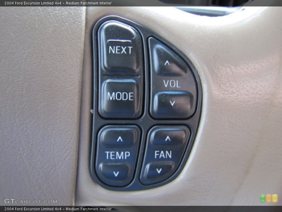 Medium Parchment Interior Controls for the 2004 Ford Excursion Limited 4x4 #55066677