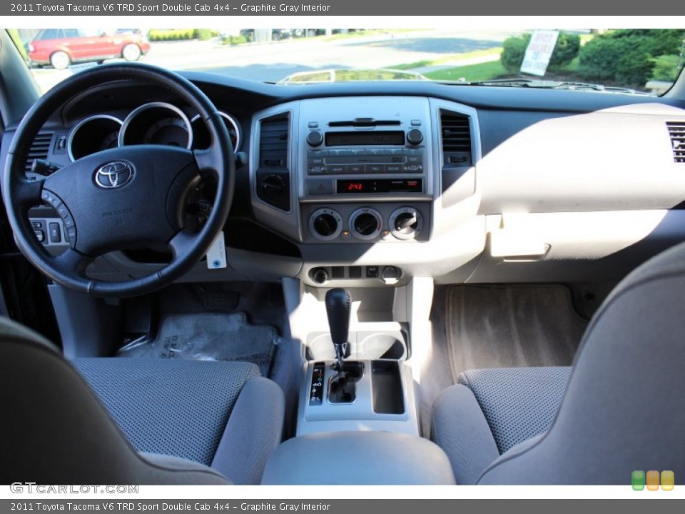 Graphite Gray Interior Dashboard for the 2011 Toyota Tacoma V6 TRD Sport Double Cab 4x4 #55079572