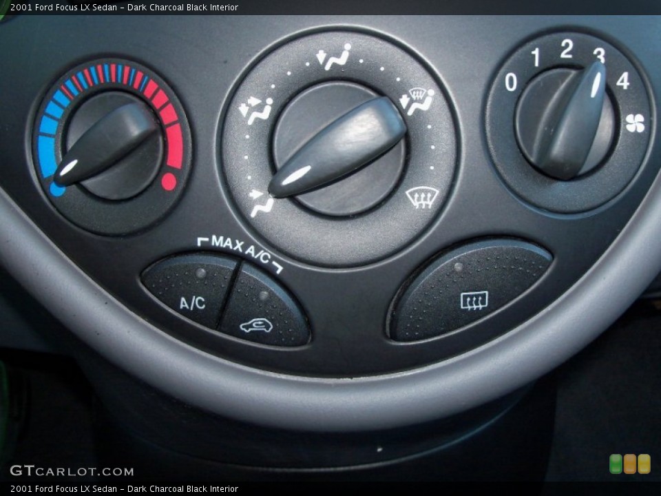 Dark Charcoal Black Interior Controls for the 2001 Ford Focus LX Sedan #55091050