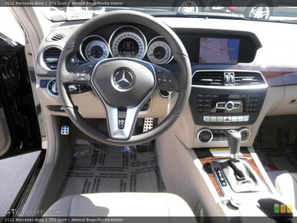 Almond Beige/Mocha Interior Dashboard for the 2012 Mercedes-Benz C 250 Sport #55100845
