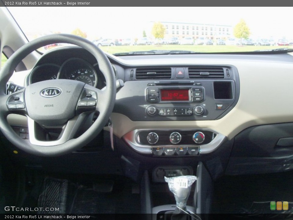 Beige Interior Dashboard for the 2012 Kia Rio Rio5 LX Hatchback #55181517