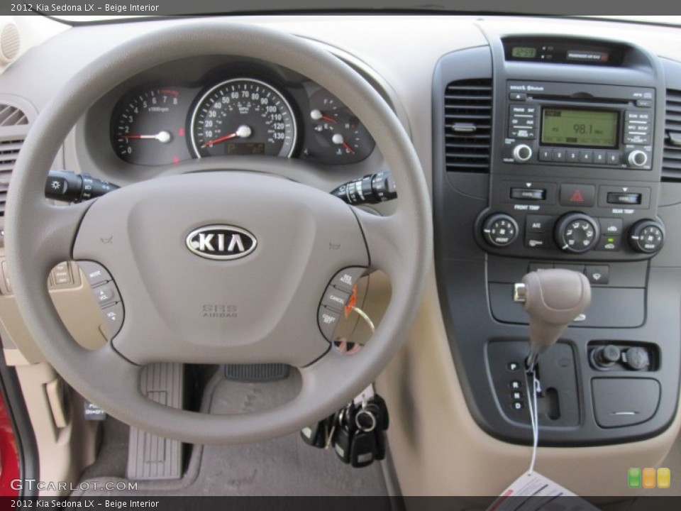 Beige Interior Dashboard for the 2012 Kia Sedona LX #55182678