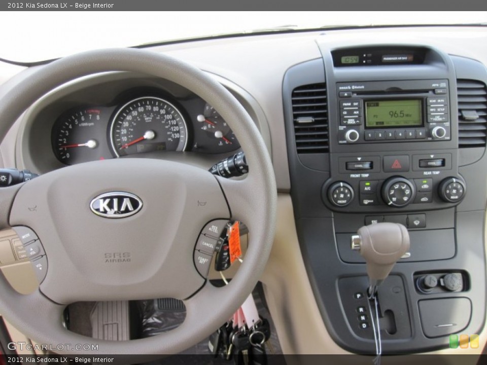 Beige Interior Controls for the 2012 Kia Sedona LX #55182984