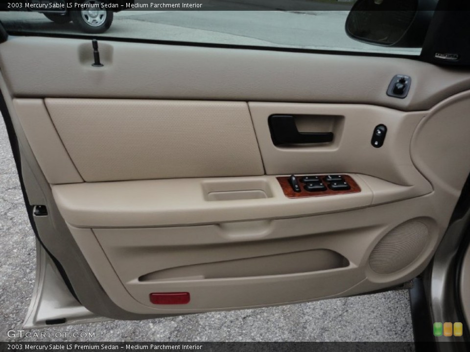 Medium Parchment Interior Door Panel for the 2003 Mercury Sable LS Premium Sedan #55187829