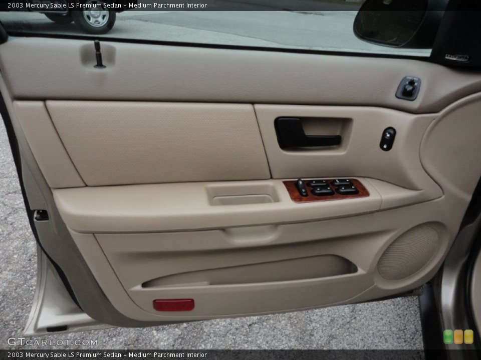 Medium Parchment Interior Door Panel for the 2003 Mercury Sable LS Premium Sedan #55187829