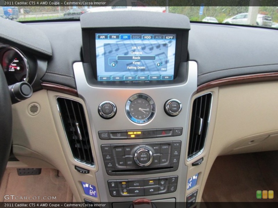 Cashmere/Cocoa Interior Controls for the 2011 Cadillac CTS 4 AWD Coupe #55208937