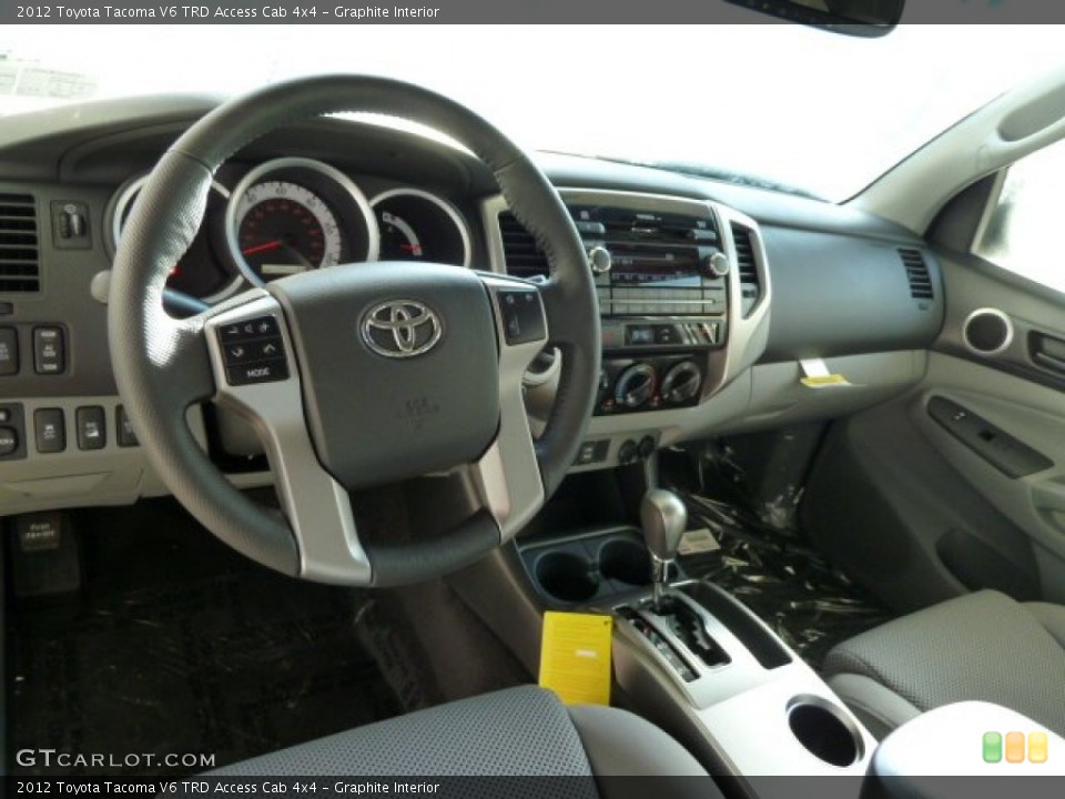Graphite Interior Dashboard for the 2012 Toyota Tacoma V6 TRD Access Cab 4x4 #55216831