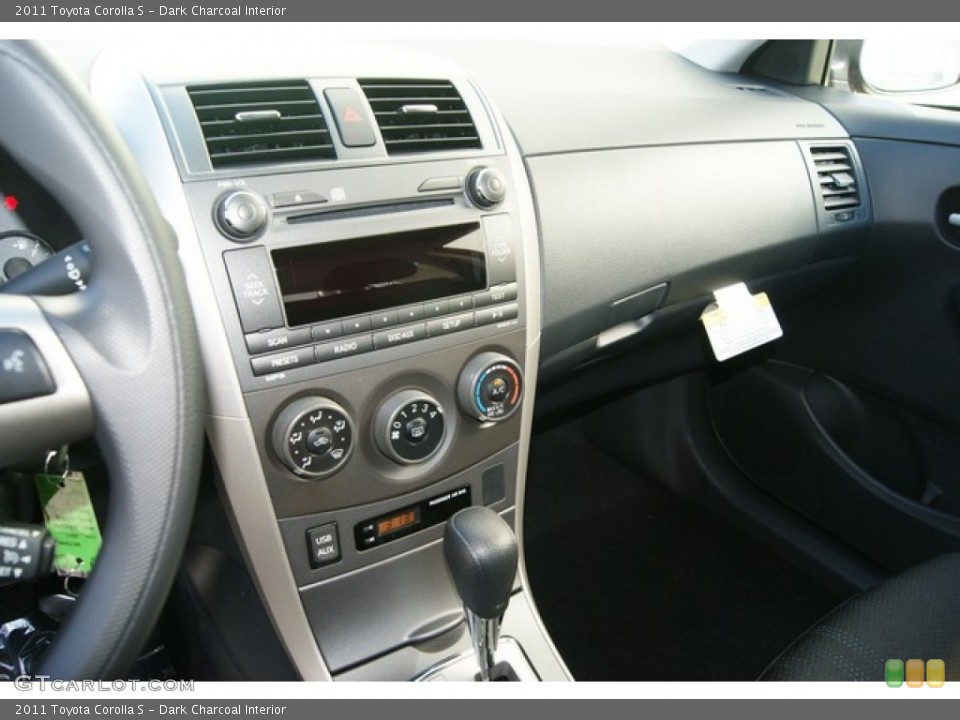 Dark Charcoal Interior Dashboard for the 2011 Toyota Corolla S #55225507