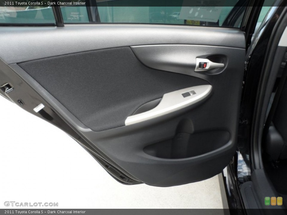 Dark Charcoal Interior Door Panel for the 2011 Toyota Corolla S #55228114