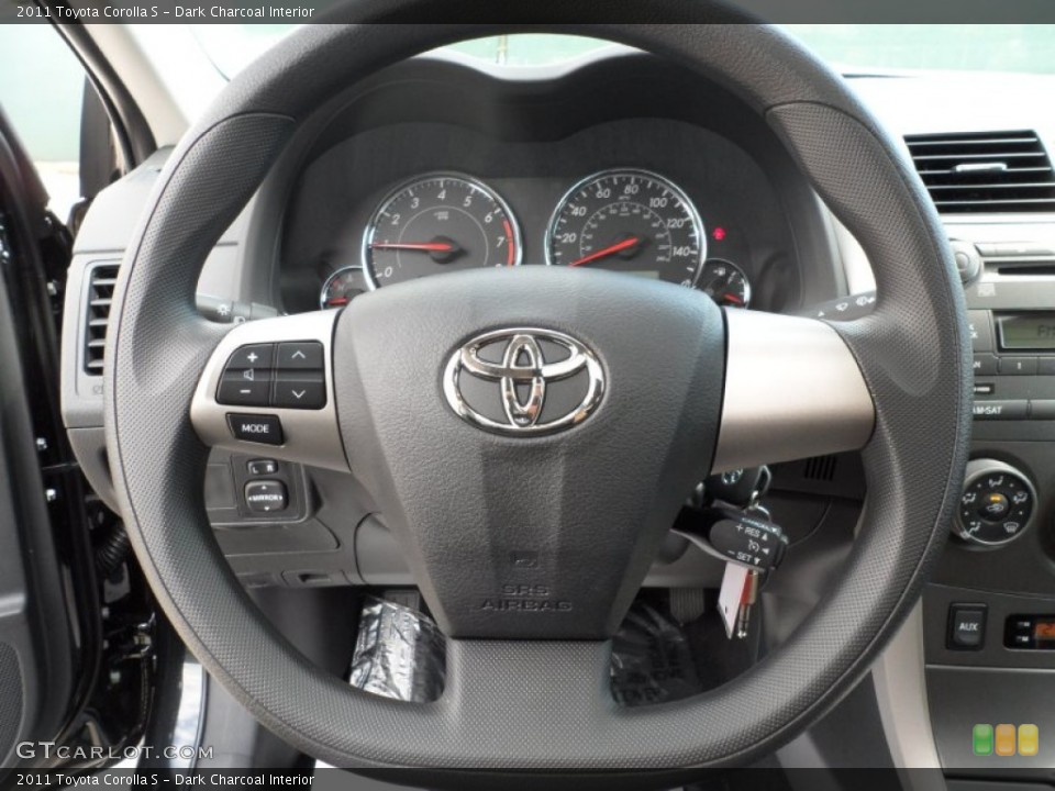 Dark Charcoal Interior Steering Wheel for the 2011 Toyota Corolla S #55228225
