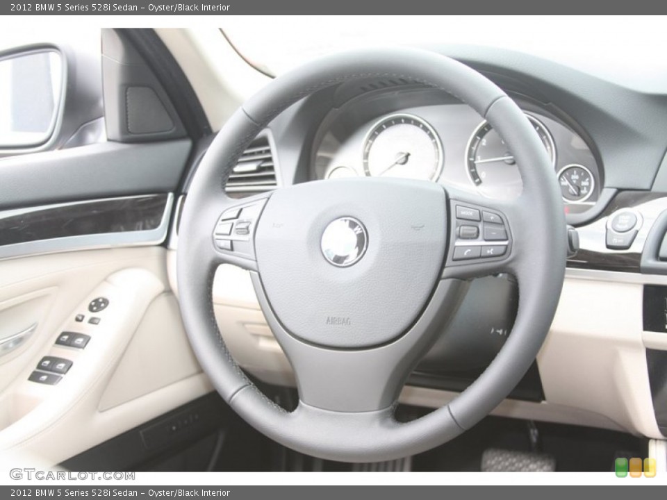 Oyster/Black Interior Steering Wheel for the 2012 BMW 5 Series 528i Sedan #55230399