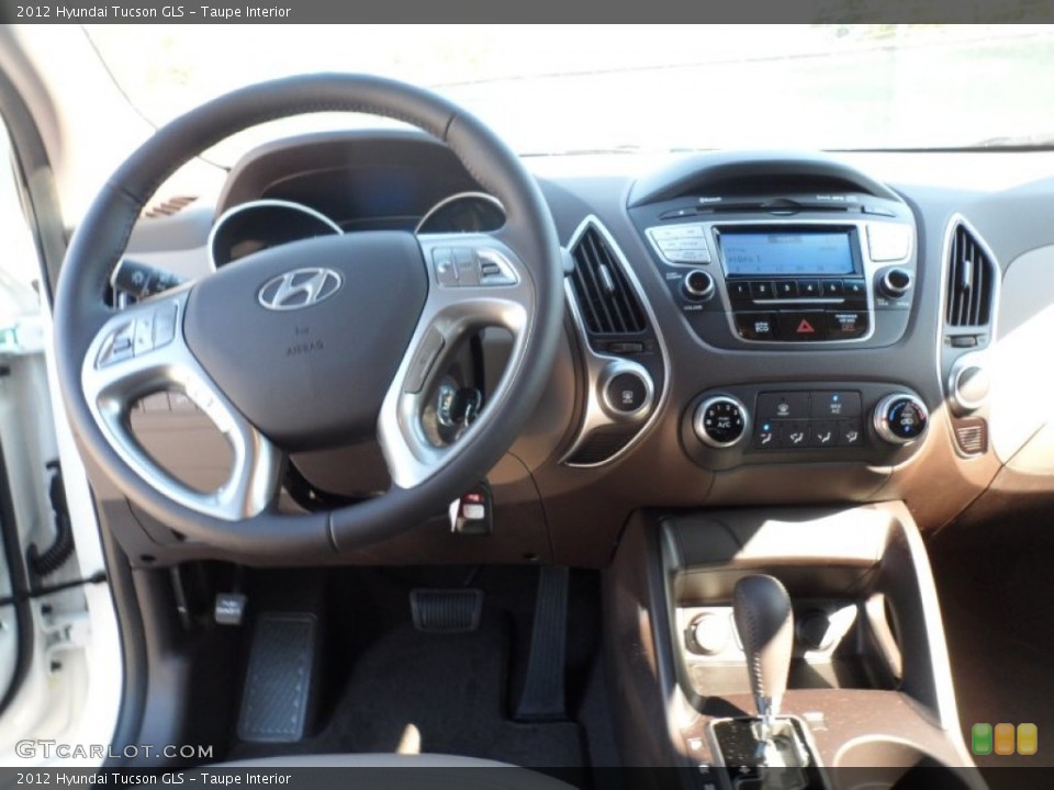 Taupe Interior Dashboard for the 2012 Hyundai Tucson GLS #55242730