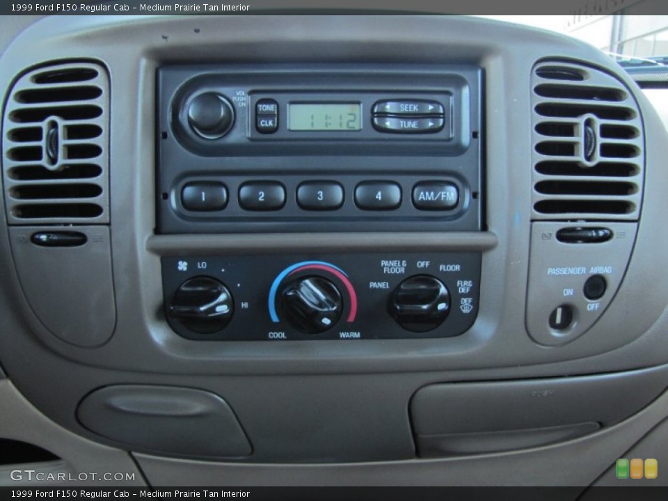 Medium Prairie Tan Interior Audio System for the 1999 Ford F150 Regular Cab #55242940