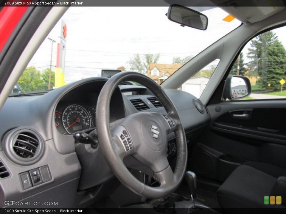 Black Interior Dashboard for the 2009 Suzuki SX4 Sport Sedan #55261981
