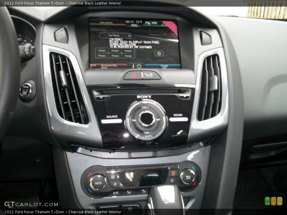 Charcoal Black Leather Interior Controls for the 2012 Ford Focus Titanium 5-Door #55277624