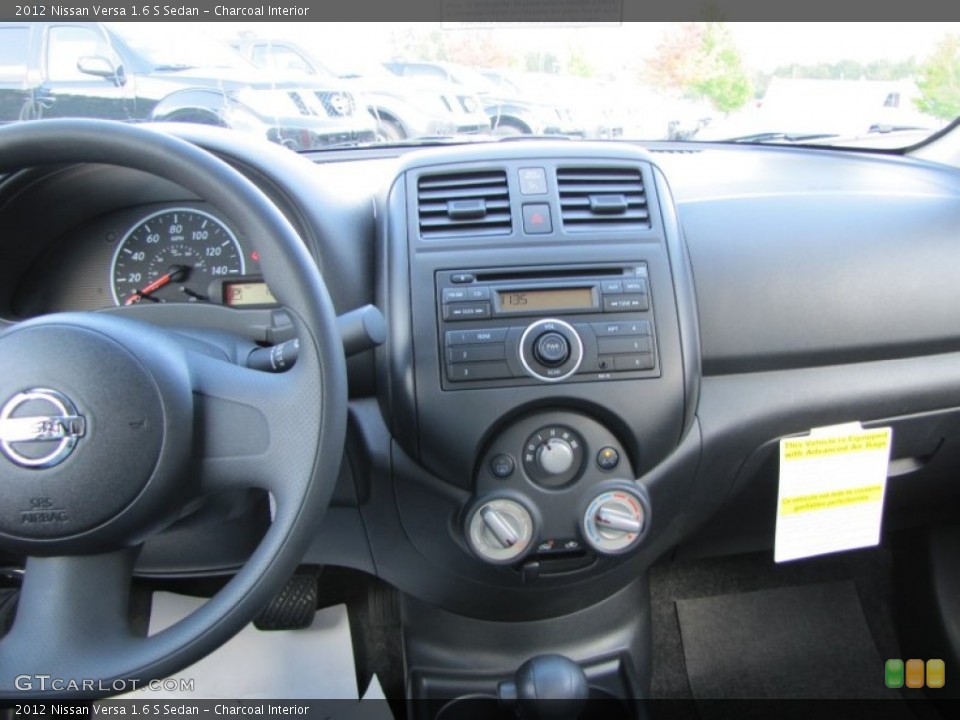 Charcoal Interior Dashboard for the 2012 Nissan Versa 1.6 S Sedan #55282341