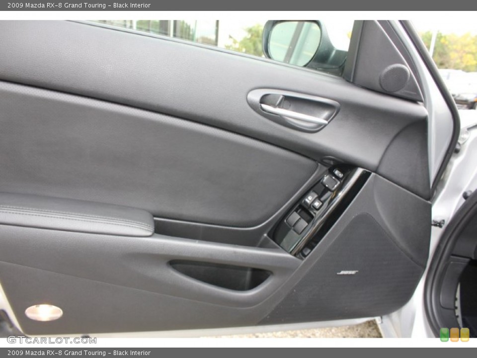 Black Interior Door Panel for the 2009 Mazda RX-8 Grand Touring #55283968