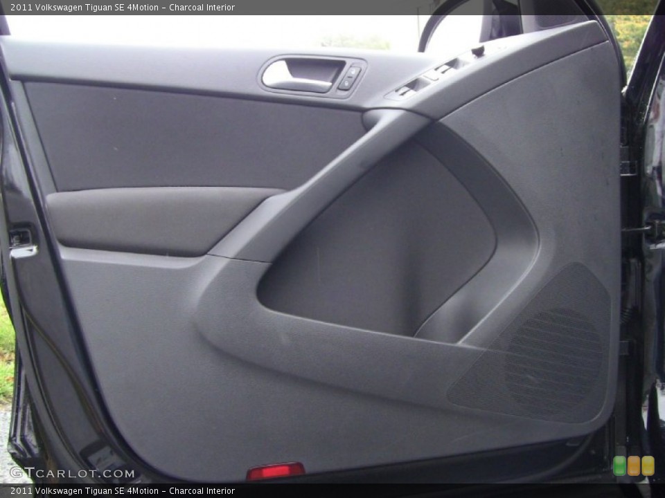 Charcoal Interior Door Panel for the 2011 Volkswagen Tiguan SE 4Motion #55295359