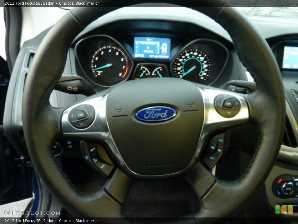 Charcoal Black Interior Steering Wheel for the 2012 Ford Focus SEL Sedan #55314309