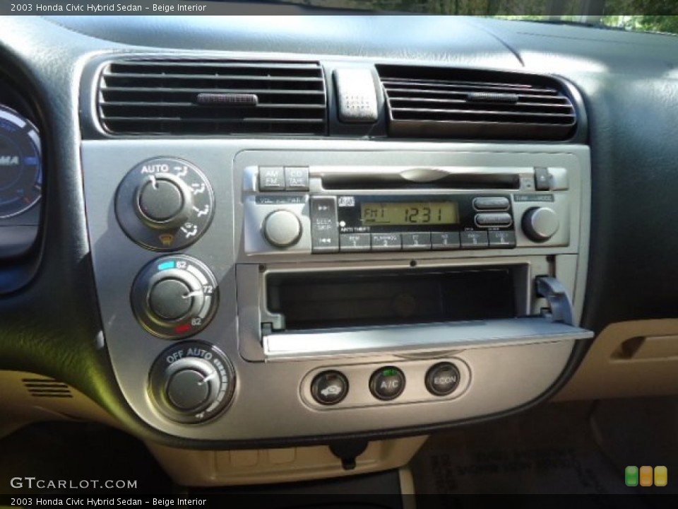 Beige Interior Audio System for the 2003 Honda Civic Hybrid Sedan #55315795