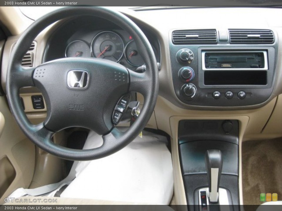 Ivory Interior Dashboard for the 2003 Honda Civic LX Sedan #55316689