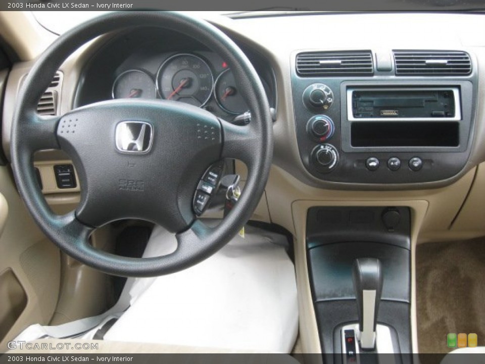 Ivory Interior Dashboard for the 2003 Honda Civic LX Sedan #55316689