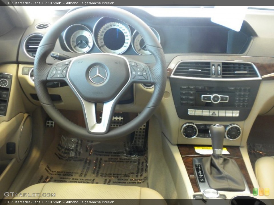 Almond Beige/Mocha Interior Dashboard for the 2012 Mercedes-Benz C 250 Sport #55317343