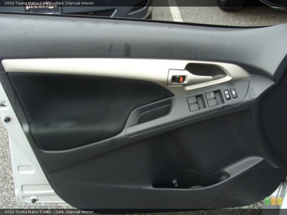 Dark Charcoal Interior Door Panel for the 2009 Toyota Matrix S AWD #55324417