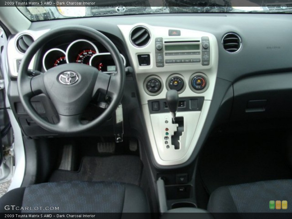 Dark Charcoal Interior Dashboard for the 2009 Toyota Matrix S AWD #55324432