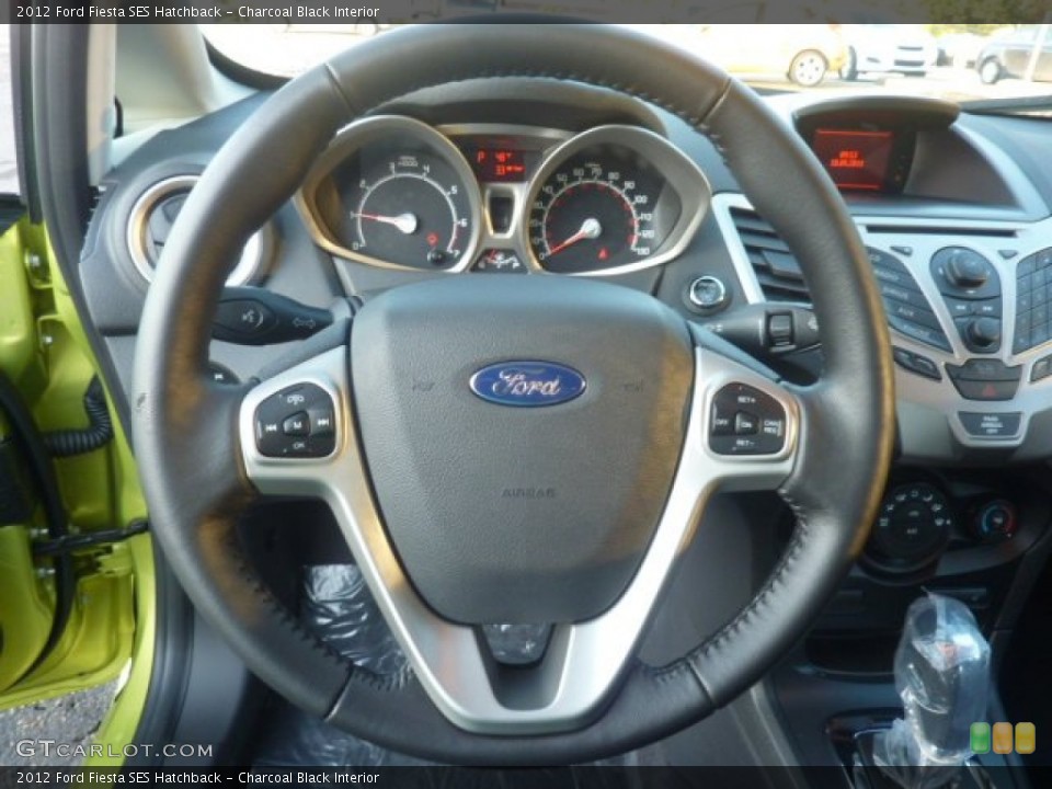 Charcoal Black Interior Steering Wheel for the 2012 Ford Fiesta SES Hatchback #55384179