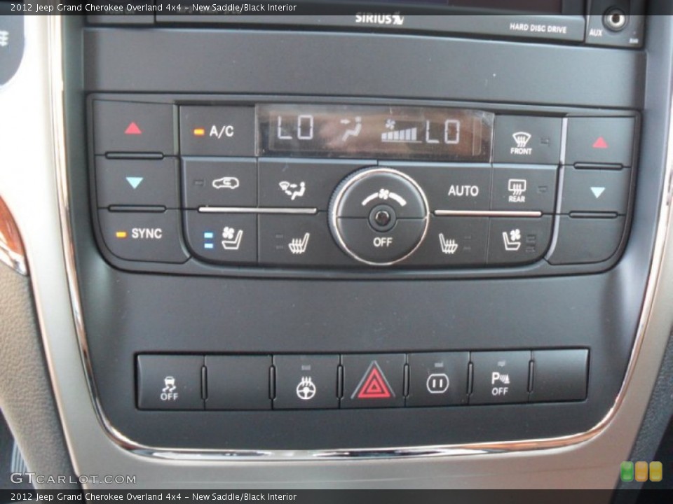 New Saddle/Black Interior Controls for the 2012 Jeep Grand Cherokee Overland 4x4 #55397061
