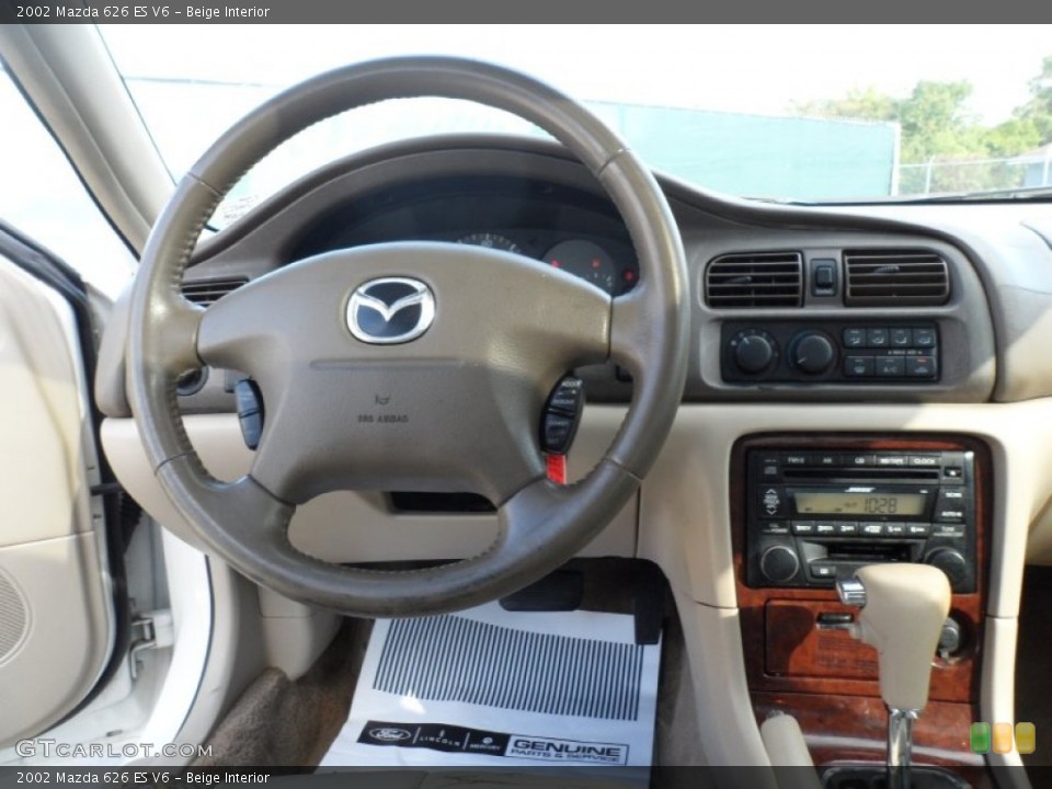 Beige Interior Dashboard for the 2002 Mazda 626 ES V6 #55397409