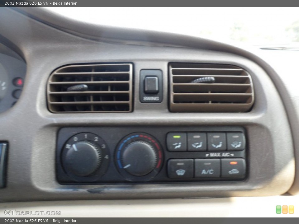 Beige Interior Controls for the 2002 Mazda 626 ES V6 #55397418