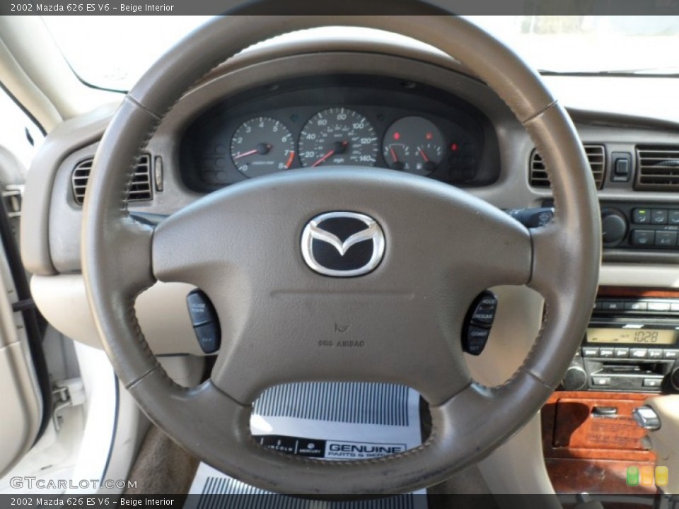 Beige Interior Steering Wheel for the 2002 Mazda 626 ES V6 #55397445