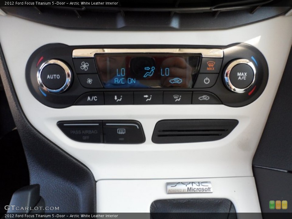 Arctic White Leather Interior Controls for the 2012 Ford Focus Titanium 5-Door #55399136