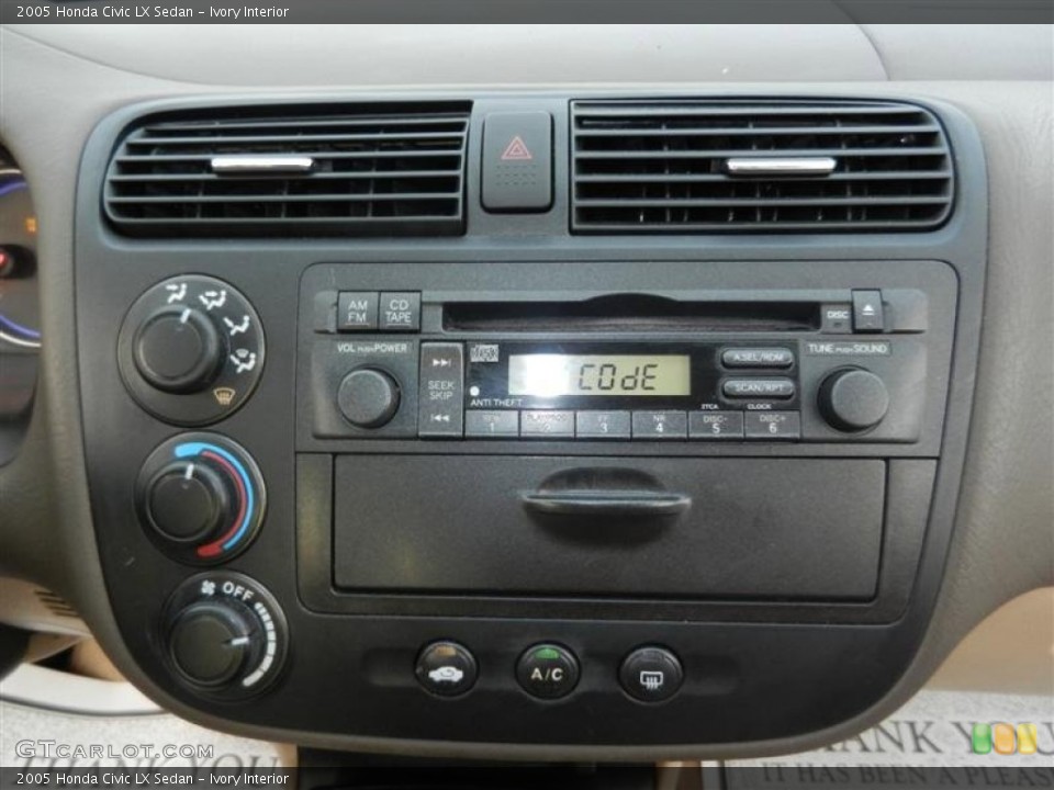 Ivory Interior Audio System for the 2005 Honda Civic LX Sedan #55428996