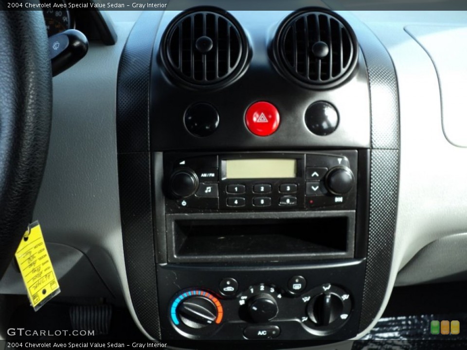 Gray Interior Controls for the 2004 Chevrolet Aveo Special Value Sedan #55432480