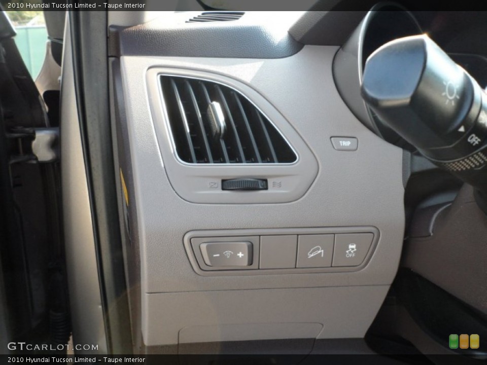 Taupe Interior Controls for the 2010 Hyundai Tucson Limited #55441918