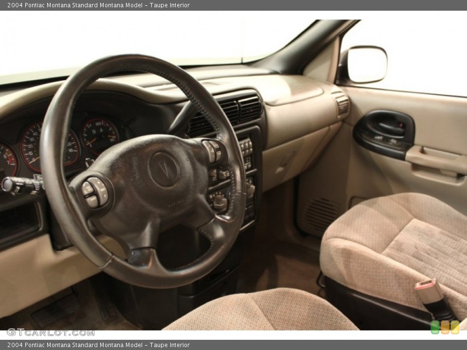 Taupe Interior Dashboard for the 2004 Pontiac Montana  #55444861