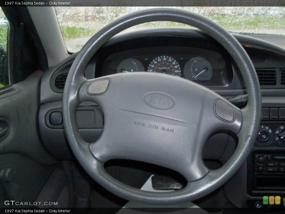 Gray Interior Steering Wheel for the 1997 Kia Sephia Sedan #55469972