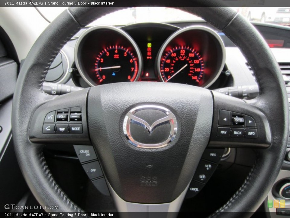 Black Interior Steering Wheel for the 2011 Mazda MAZDA3 s Grand Touring 5 Door #55511549