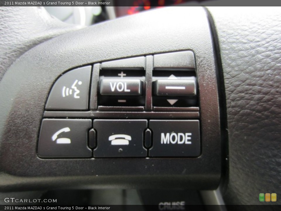 Black Interior Controls for the 2011 Mazda MAZDA3 s Grand Touring 5 Door #55511558