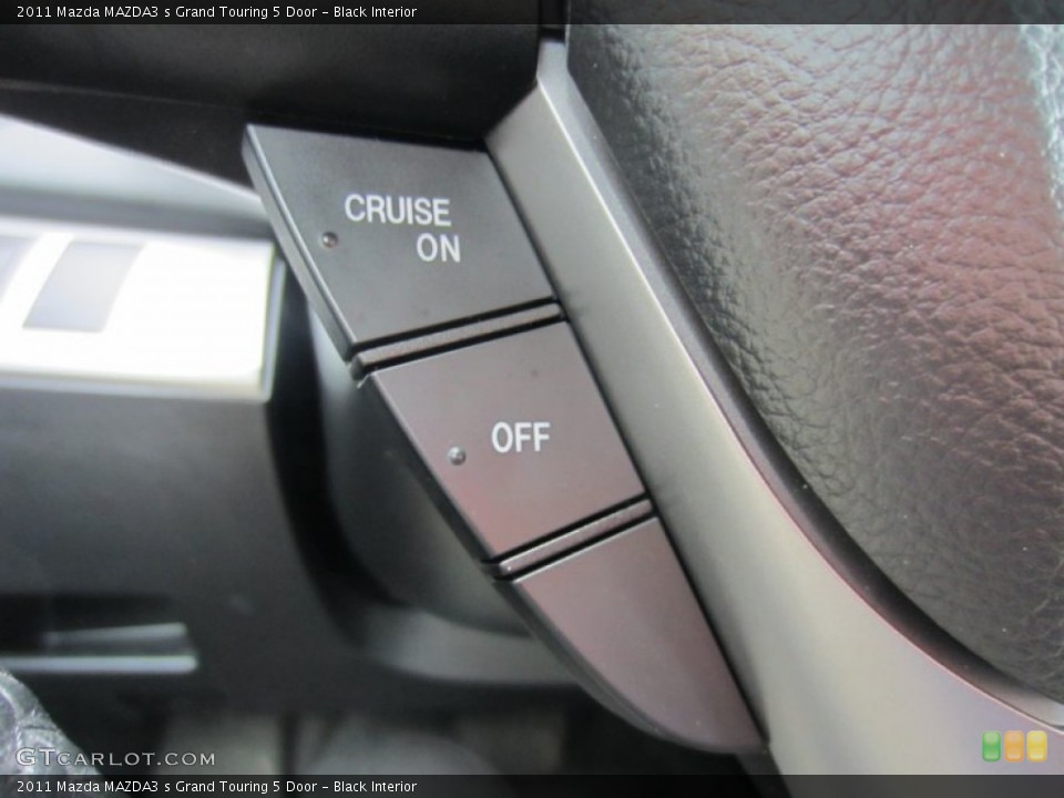 Black Interior Controls for the 2011 Mazda MAZDA3 s Grand Touring 5 Door #55511567